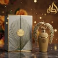 Lattafa Afeef by Lattafa 100ml EDP — Gold fluted perfume bottle with peacock feather design box, adorned with golden peacocks and colorful gems
