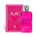 Maison Alhambra Alive Now by Maison Alhambra 100ml — A bright pink faceted glass perfume bottle and its matching pink box with white speckles and geometric design, set against a white background. | Maison Alhambra Alive Now by Maison Alhambra 100ml — Botol kaca berwarna merah jambu terang berbentuk faset dan kotak