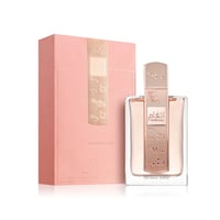 Lattafa Angham Second Song by Lattafa 100ml — Pink box with musical notes design next to a clear glass perfume bottle with a rose gold cap and musical notes.