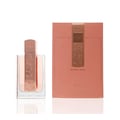 Lattafa Angham Second Song by Lattafa 100ml — Botol minyak wangi kaca jernih dengan penutup emas ros berlubang dan jalur hiasan, diletakkan bersebelahan kotak emas ros sepadan berhias nota muzik.