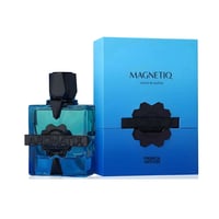 French Avenue Aromatix Magnetiq — Blue glass perfume bottle with black cap and black label, next to a blue box with "MAGNETIQ" text and a black emblem.