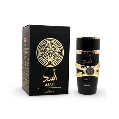 Lattafa Asad Lattafa EDP 100ml Men — Black perfume box with gold lion emblem and bottle with gold criss-cross accents on white background.