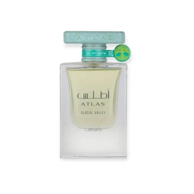 Lattafa Atlas Glacial Valley — Clear glass perfume bottle with a light yellow liquid, featuring a textured teal cap and a green tree emblem on the side.