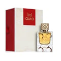 Lattafa Aura by Lattafa 60ml EDP — A clear glass perfume bottle with gold ornate cap and golden liquid sits next to its white and red patterned box with gold line art and red ribbon | Lattafa Aura by Lattafa 60ml EDP — Botol minyak wangi kaca jernih dengan penutup berornamen emas dan cecair keemasan duduk bersebelahan
