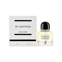Maison Alhambra By Saffron Eau De Parfum — Kotak putih dan botol minyak wangi kaca jernih bertutup hitam, kedua-duanya ada label "BY SAFFRON" dan teks "EAU DE PARFUM".
