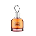 Maison Alhambra Candid Tonight — A clear glass perfume bottle with an amber liquid and a faceted crystal stopper, set against a white background. | Maison Alhambra Candid Tonight — Botol kaca jernih dengan cecair berwarna ambar dan penutup kristal berfaset, diletakkan di atas latar belakang putih.