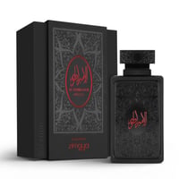Zimaya Al Embratur Absolu Eau De Parfum 100ml by Zimaya — Black perfume bottle and box with intricate embossed patterns and red Arabic calligraphy | Zimaya Al Embratur Absolu Eau De Parfum 100ml by Zimaya — Botol dan kotak minyak wangi hitam dengan corak timbul yang rumit dan kaligrafi Arab merah