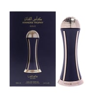 Lattafa Pride Al Khas Winners Trophy Gold 100ml — A dark blue perfume box with gold text and a gold globe-topped bottle next to it on a white background. | Lattafa Pride Al Khas Winners Trophy Gold 100ml — Kotak minyak wangi biru gelap dengan teks emas dan botol bertopi bola dunia emas di sebelahnya di atas latar