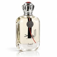 Ard Al Zaafaran Al Sayaad For Men — Clear glass perfume bottle with silver ornate cap, featuring Arabic script and a red and black design element on the label.