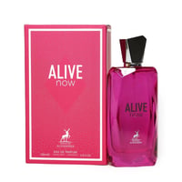 Maison Alhambra Alive Now — Pink box with white text and dotted pattern next to a vibrant pink glass perfume bottle with a black and silver cap. | Maison Alhambra Alive Now — Kotak merah jambu dengan teks putih dan corak berbintik di sebelah botol minyak wangi kaca merah jambu terang dengan penutup hitam dan perak.