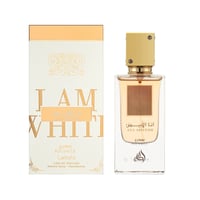 Lattafa Ana Abiyedh Poudree by Lattafa 60ml — A white box with gold accents and Arabic calligraphy sits next to a clear glass perfume bottle with a gold cap and a brown label. | Lattafa Ana Abiyedh Poudree by Lattafa 60ml — Kotak putih dengan aksen emas dan kaligrafi Arab duduk di sebelah botol minyak wangi kaca