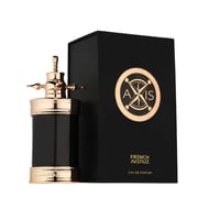 French Avenue Axis by French Avenue 100ml — Black perfume bottle with gold accents and a compass-like cap, next to its black presentation box with a gold compass logo. | French Avenue Axis by French Avenue 100ml — Botol minyak wangi hitam dengan aksen emas dan penutup seperti kompas, bersebelahan dengan kotak