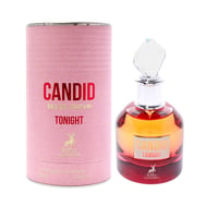 Maison Alhambra Candid Tonight Eau de Parfum — A pink cylindrical box with gold deer logo stands next to a clear glass perfume bottle with amber and red liquid, topped with a faceted crystal stopper. | Maison Alhambra Candid Tonight Eau de Parfum — Kotak silinder merah jambu dengan logo rusa emas berdiri di sebelah