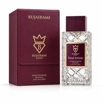 Bujairami Dead Serious — Clear glass perfume bottle with diamond-cut pattern and maroon cap, next to a maroon presentation box with gold logo.