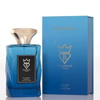 Bujairami Enforcer Eau de Parfum — Blue faceted glass bottle with gold cap, next to its blue box packaging, both featuring the Bujairami logo.