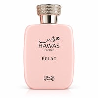 RASASI Hawas Eclat by Rasasi — A light pink perfume bottle with a silver cap encrusted with clear rhinestones. Text on the bottle reads 'HAWAS For Her ÉCLAT' in black.