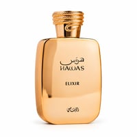 RASASI Hawas Elixir by Rasasi 100ml EDP — A gleaming gold bottle with a snake-like textured cap, featuring Arabic and English text.