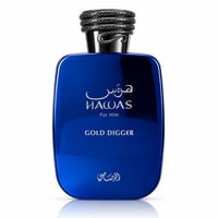 RASASI Hawas Gold Digger by Rasasi — Blue glass perfume bottle with a coiled snake-like cap, featuring Arabic script and "HAWAS For Him GOLD DIGGER" text in white.