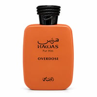 RASASI Hawas Overdose — Orange perfume bottle with black textured cap and Arabic script.