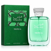 RASASI Hawas Tropical by Rasasi 100ml EDP — Kotak hijau corak ular dan motif daun sebelah botol kaca jernih wangian tropikal hijau bertutup putih bertekstur.