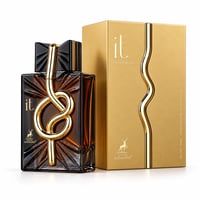 Maison Alhambra IT by Maison Alhambra 100ml EDP Men — Amber glass perfume bottle with gold knot detail, next to a gold box with wavy gold accent.