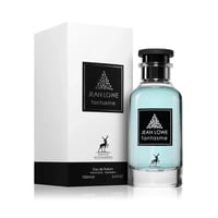 Maison Alhambra Jean Lowe Fantasme 100ml — A light blue eau de parfum bottle and its white packaging box, both featuring a black label with gold text and a deer silhouette. | Maison Alhambra Jean Lowe Fantasme 100ml — Botol eau de parfum biru muda dan kotak pembungkus putihnya, kedua-duanya menampilkan label hitam