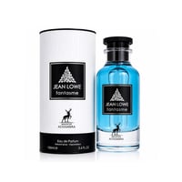 Maison Alhambra Jean Lowe Fantasme 100ml — A blue liquid perfume bottle and its white textured cylindrical box are placed side-by-side against a white background. Both feature a black label with a silver deer silhouette and intricate leaf design. | Maison Alhambra Jean Lowe Fantasme 100ml — Botol minyak wangi cecair