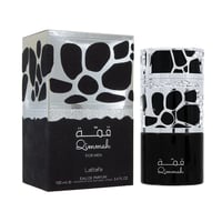 Lattafa Qimmah Eau De Parfum for Men 100ml — A black perfume box with a clear plastic overlay featuring a black and silver abstract pattern, next to a black perfume bottle with a silver abstract patterned cap. | Lattafa Qimmah Eau De Parfum for Men 100ml — Kotak minyak wangi hitam dengan lapisan plastik jernih