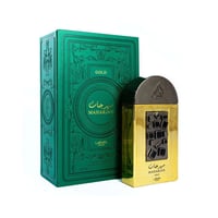 Lattafa Pride Maharjan Gold — A green embossed box with gold text and a gold perfume bottle with a dark, textured panel are displayed against a white background. | Lattafa Pride Maharjan Gold — Kotak hijau bertebuk dengan teks emas dan botol minyak wangi emas dengan panel bertekstur gelap dipaparkan berlatar belakang