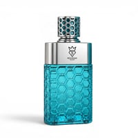 Bujairami No Limit by Bujairami 100ml EDP Unisex — A turquoise glass perfume bottle with a honeycomb texture, a silver cap with a geometric pattern, and a silver label featuring a crown and the brand name. | Bujairami No Limit by Bujairami 100ml EDP Unisex — Botol minyak wangi kaca biru kehijauan dengan tekstur sarang
