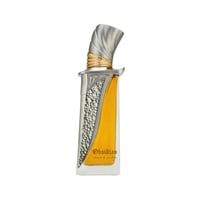 French Avenue Obsidian Eau De Parfum — A tall, rectangular glass perfume bottle with a unique, sculpted silver and gold cap resembling a dagger hilt, filled with amber-colored liquid.