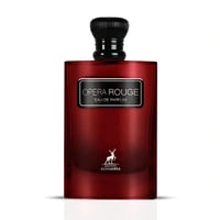 Maison Alhambra Opera Rouge Eau de Parfum — A red glass perfume bottle with a black cap and a black label that reads "OPERA ROUGE EAU DE PARFUM" and a deer logo with "MAISON ALHAMBRA" below it. | Maison Alhambra Opera Rouge Eau de Parfum — Botol kaca merah dengan penutup hitam dan label hitam bertuliskan "OPERA ROUGE