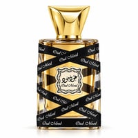 Lattafa Oud Mood 30ml by Lattafa EDP Unisex — A golden perfume bottle with a gold cap, wrapped in black ribbon printed with 'Oud Mood'. Features a decorative label with Arabic script and 'Oud Mood' text.