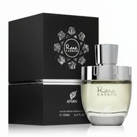 Afnan Rare Carbon — Black textured box with embossed circular design next to a clear glass perfume bottle with silver cap