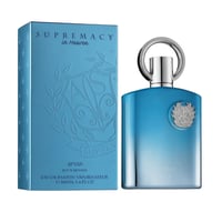 Afnan Supremacy In Heaven — Blue gradient perfume bottle with silver ring cap next to matching blue box with embossed crest