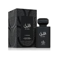 Al Wataniah Al Layl — Black perfume bottle and box with Arabic script and textured pattern.