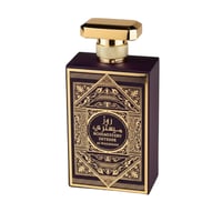 Al Wataniah Rose Mystery Intense — Purple perfume bottle with ornate gold detailing and a gold cap, isolated on a white