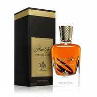 Al Wataniah Special Oud — Black and gold box next to an amber glass perfume bottle with a gold textured cap.