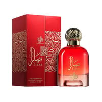Al Wataniah Tiara – Red perfume bottle with gold cap next to matching red box with ornate gold pattern