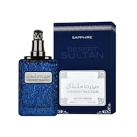 Ard Al Zaafaran Desert Sultan Sapphire — Blue textured bottle and navy blue box with silver accents, both featuring gold