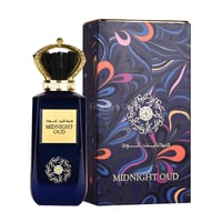 Ard Al Zaafaran Midnight Oud — Dark blue perfume bottle with gold crown cap and ornate gold label, next to a patterned box.