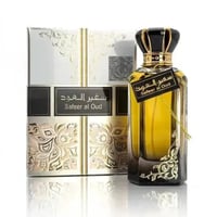 Ard Al Zaafaran Safeer Al Oud — Perfume bottle with gold accents and ornate box on a white background
