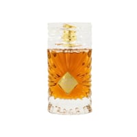 Gulf Orchid Sweet Heaven Extreme by Gulf Orchid 100ml Unisex — Amber liquid in a clear, fluted glass bottle with a gold diamond-shaped label and a gold cap, isolated on a white background.