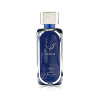 Lattafa Hayaati Al Maleky by Lattafa – 100 ml for Men, a rectangular dark blue glass perfume bottle with a silver cap, featuring Arabic and English text.