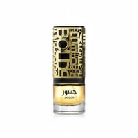 Lattafa Jasoor by Lattafa Perfumes 100 ml Unisex — A clear glass perfume bottle with a gold decorative cage featuring cut-out letters, containing golden liquid, with 'Jasoor' and 'Lattafa' branding.