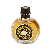 Lattafa Oud Al Sahraa by Lattafa Perfumes – 100 ml Unisex, round amber glass bottle with ornate dark brown and gold circular emblem on front, dark brown cap with gold chain detail