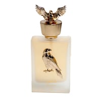 Lattafa Pride Shaheen Gold by Lattafa Perfumes Unisex 100 ml — Frosted glass perfume bottle with a gold falcon emblem on the front and a gold falcon figurine cap.