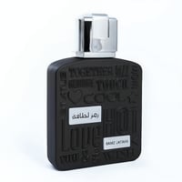 Lattafa Ramz Silver by Lattafa 100ml EDP for Men — Black perfume bottle with embossed text and a silver cap, set against a white background.