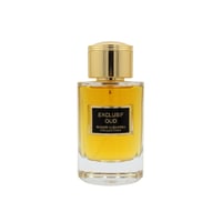 Maison Alhambra Exclusif Oud — Clear glass perfume bottle with golden cap and black label, filled with amber liquid.