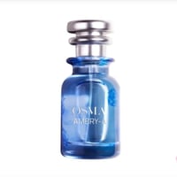 Osma Osma Ambry A Fresh & Fly 75ml EDP — Blue glass perfume bottle with silver cap, showing the brand name OSMA and product name AMBRY-A, with subtle floral etchings on the glass.